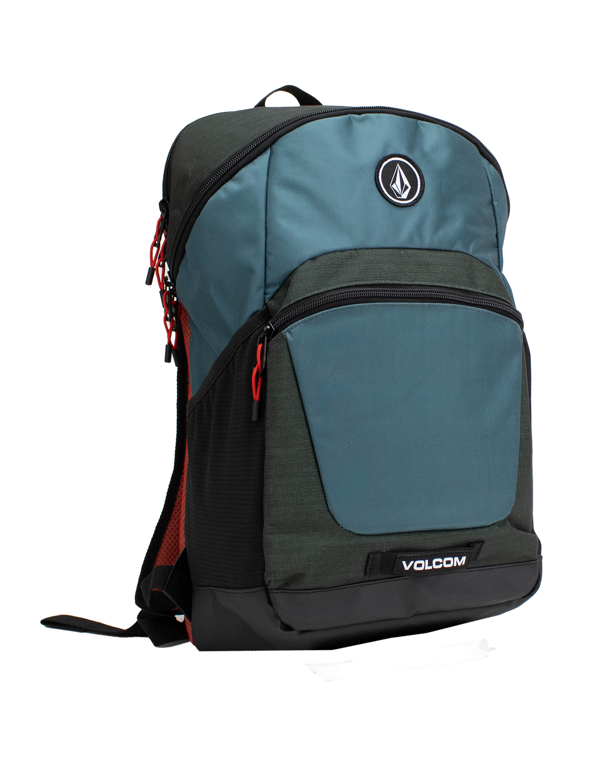 The Volcom Men's Slam School Backpack, shown in blue and black with red zipper pulls, features a front zip pocket, a large main compartment with a padded laptop sleeve, and a side mesh pocket, displayed standing upright on a white background.