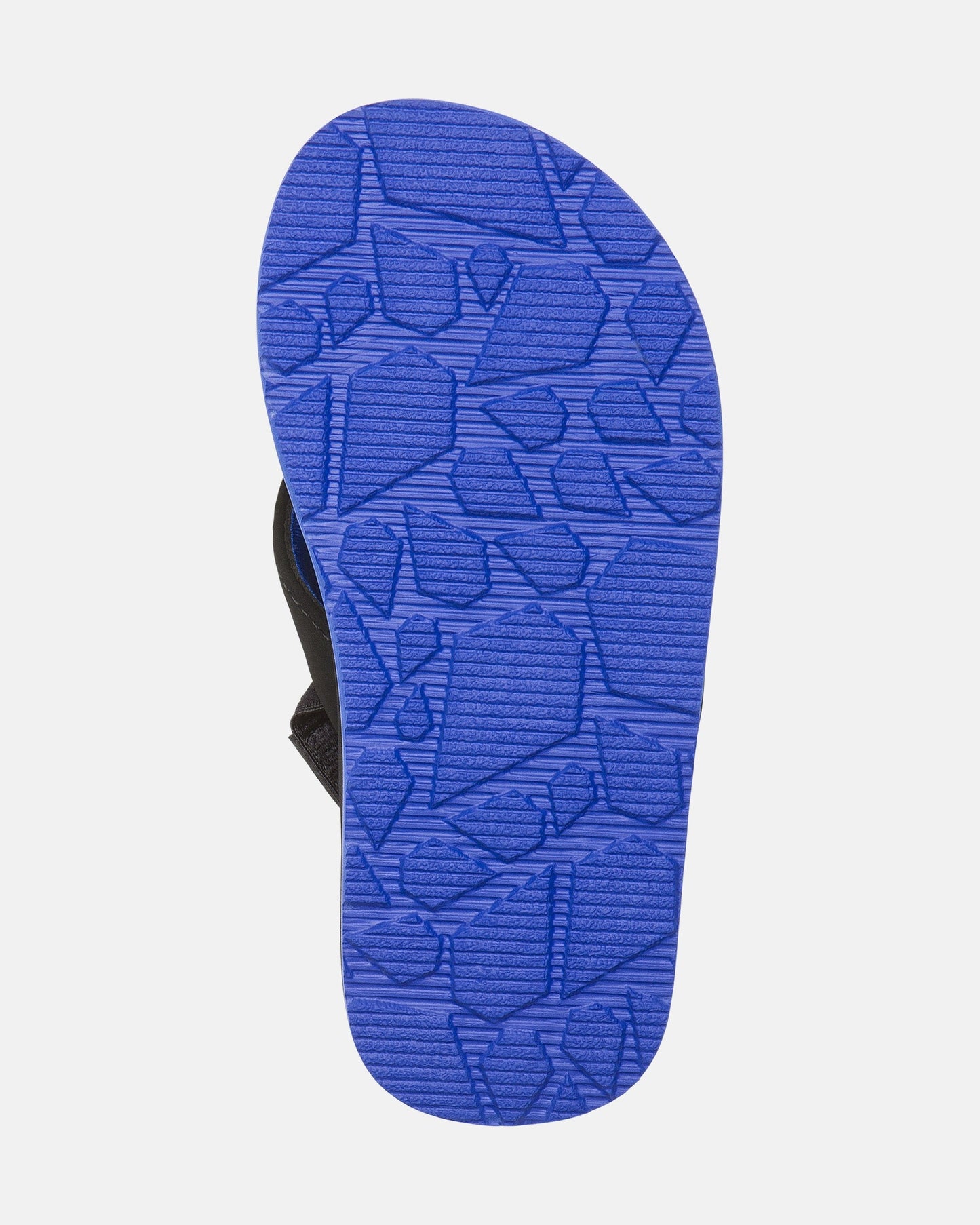 The image shows the bottom sole of the Volcom Kids' Victor 2 Little Youth sandal. It features a bright blue, geometric textured sole for grip, ideal for water activities, with partially visible straps on the sides.