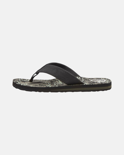 The Volcom Men's Daycation 2 Hawaii Sandal is shown in black with a patterned sole and textured straps, displayed in a side profile view on a plain white background.