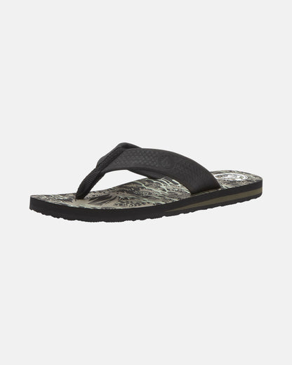 The Volcom Men's Daycation 2 Hawaii Sandal is a single black flip-flop featuring a textured strap and patterned insole, shown on a white background.