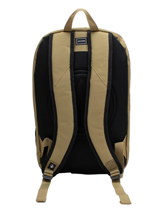 Tan and black Volcom Men's Roamer 3 Backpack shown from the back, featuring padded shoulder straps, a top handle, a mesh back panel, padded laptop sleeve, and a visible brand label near the top.
