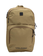 Men's Roamer 3 Backpack by Volcom in tan, featuring multiple zippered compartments, black zippers, and a small black logo patch on the upper front. This spacious 22L backpack includes a padded laptop sleeve for added convenience, with the word VOLCOM printed in black at the bottom front.