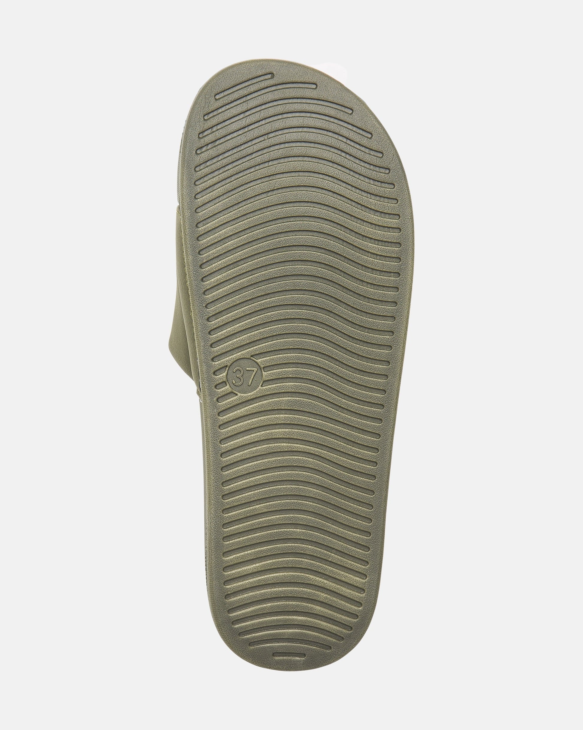 The image shows the sole of Volcom Women's Volcation Slides, featuring curved horizontal grooves for grip and a small circle with the number 37 near the arch, combining signature Volcom style with everyday comfort.
