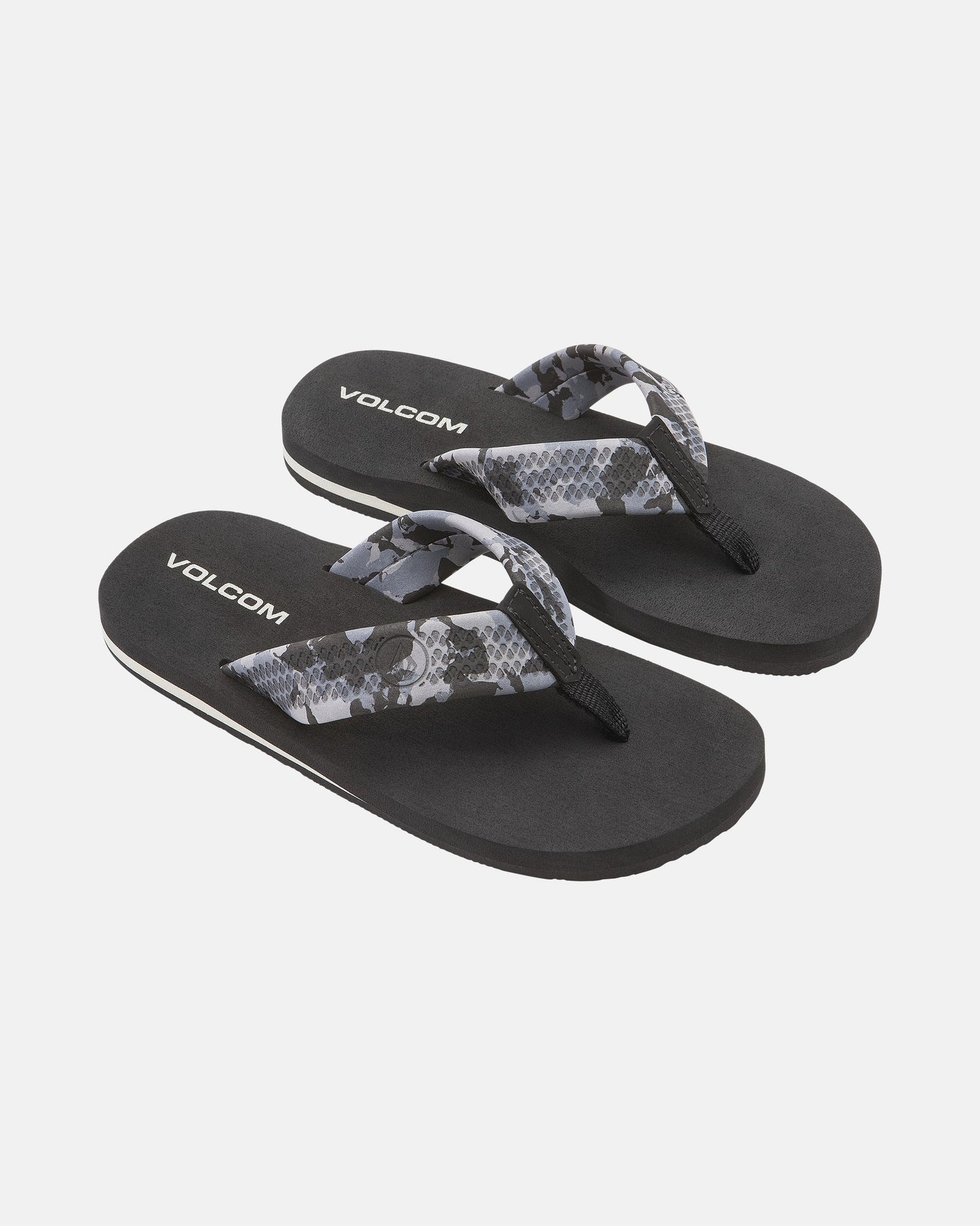 A pair of black Volcom Kids' Daycation 2 Big Youth flip-flops with gray and black patterned straps and arch support for comfort, shown on a white background.